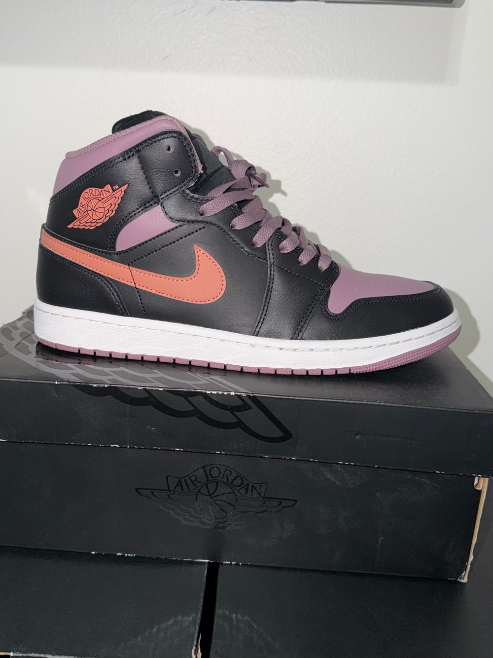 Jordan 1 Mid Black Pink Coral Swoosh Alternate